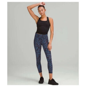 Women's Lululemon Power Thru Leggings 6 Navy Brown Leopard Print